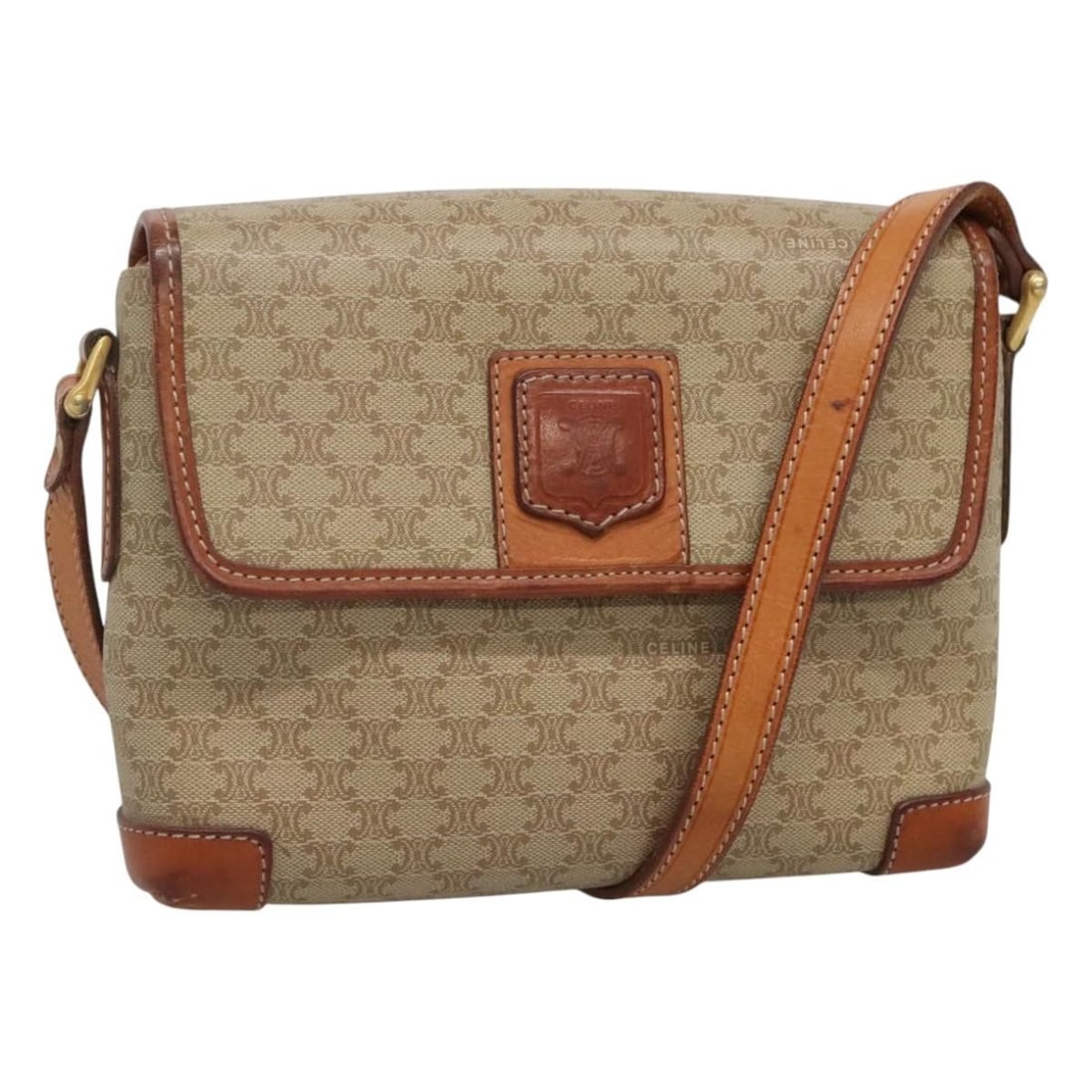 CELINE Macadam Canvas Shoulder Bag Beige Gold PVC Leather Made in Italy: CELINE Macadam Canvas Shoulder Bag Beige Gold PVC Leather Made in Italy The CELINE Macadam Canvas Shoulder Bag showcases a stylish blend of beige PVC leather and gold accents, perfect for elevating