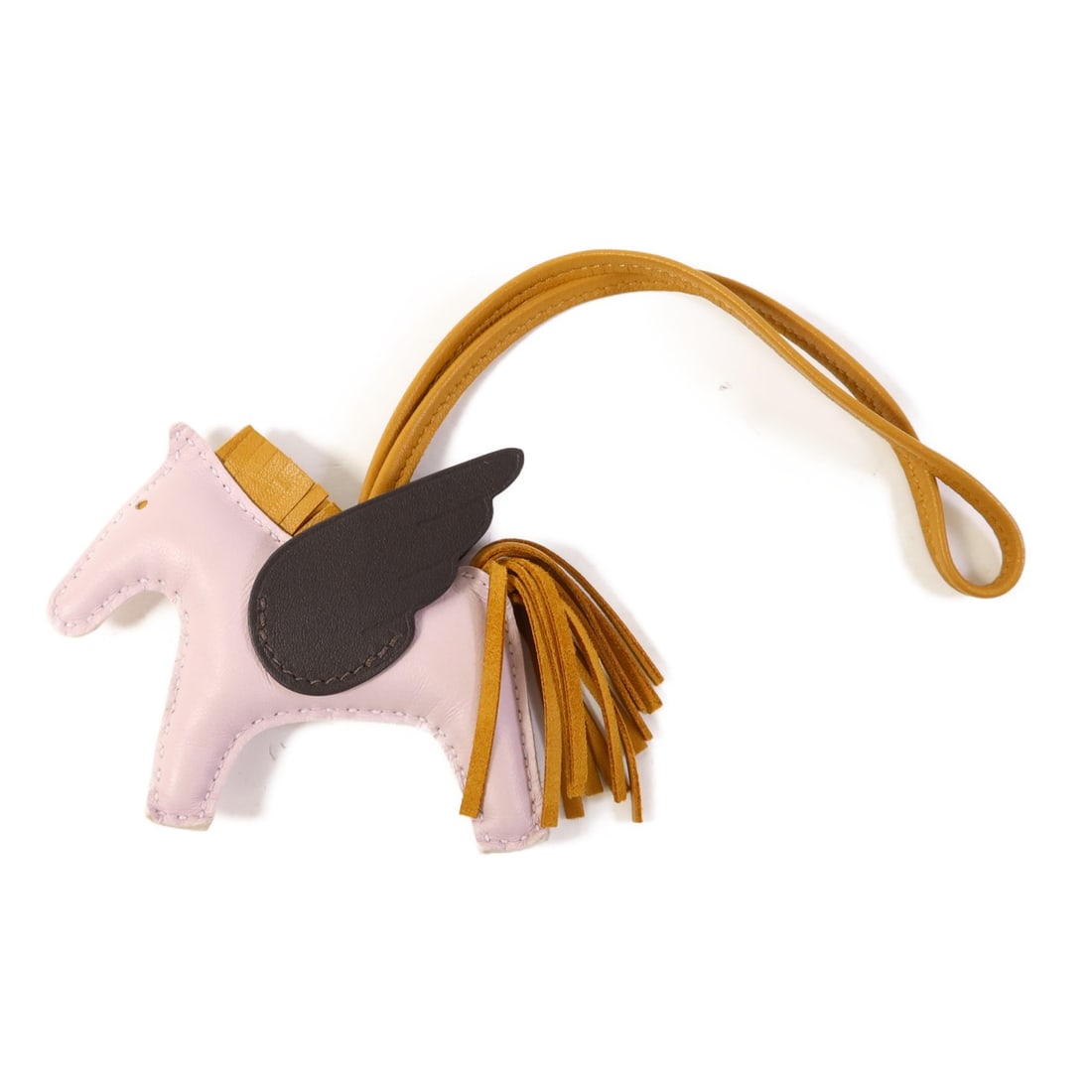 HERMES Rodeo Pegase PM Charm in Mauve Pale Lambskin: HERMES Rodeo Pegase PM Charm in Mauve Pale Lambskin Elevate your accessory game with this exquisite HERMES Rodeo Pegase PM Charm Strap. Crafted from premium lambskin leather, this charming piece