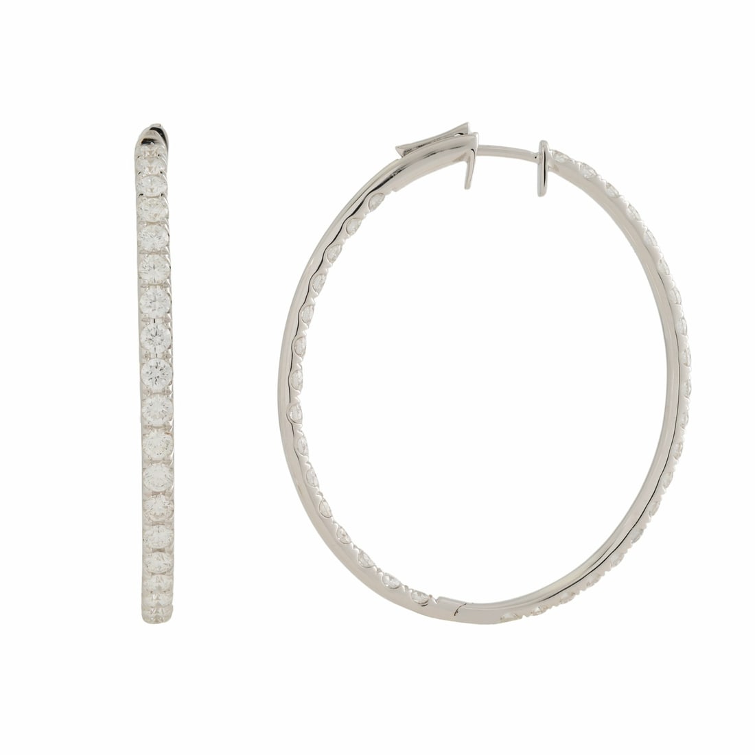 Rachel Koen 18K White Gold 3.30ct Diamond Oval Hoop Earrings: Rachel Koen 18K White Gold 3.30ct Diamond Oval Hoop Earrings Elevate your elegance with these stunning small oval hoop earrings by Rachel Koen, crafted from luxurious 18K white gold. Each earring feat