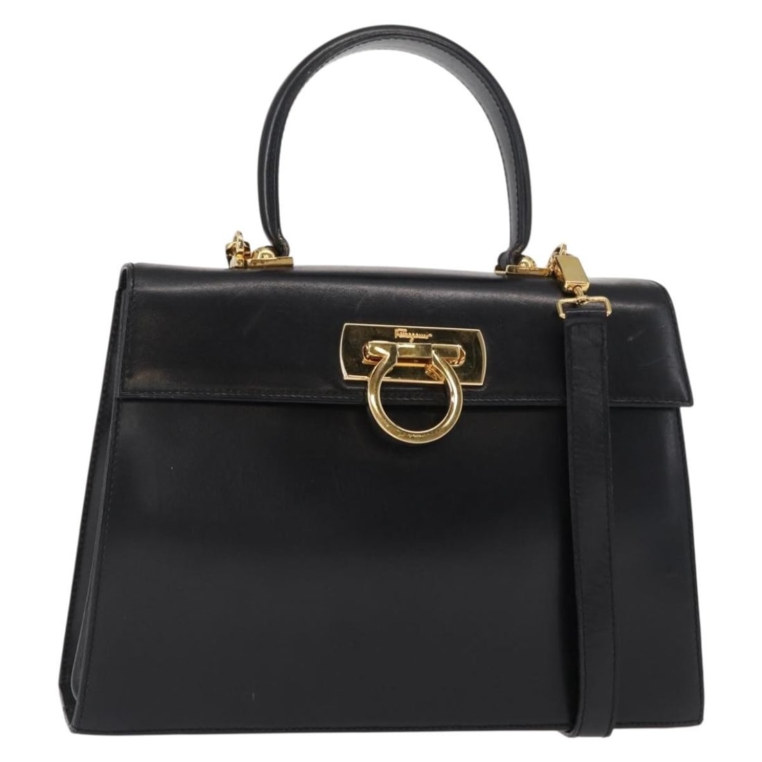 Salvatore Ferragamo Black Gold Gancini Leather Hand Bag Auth 155615: Salvatore Ferragamo Black Gold Gancini Leather Hand Bag Auth 155615 This stylish Salvatore Ferragamo Gancini Hand Bag combines luxury with practicality, featuring a sophisticated black and gold color
