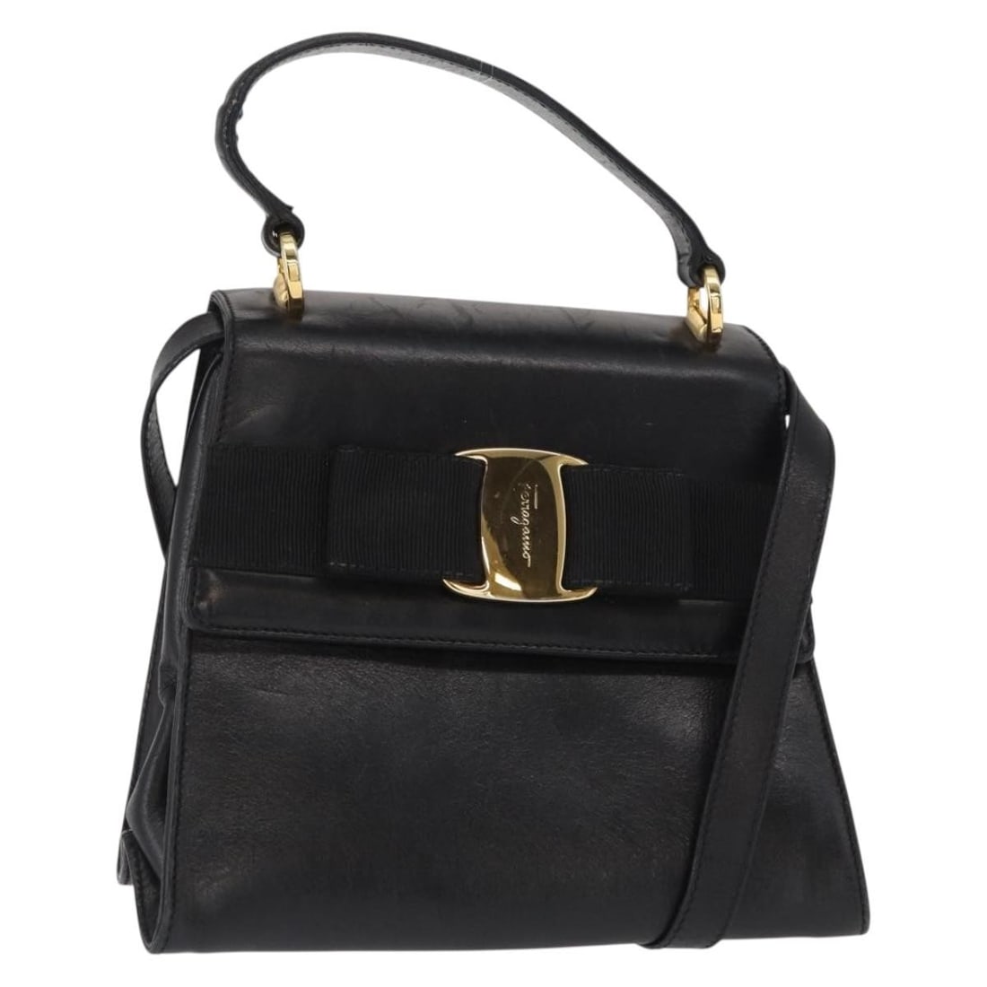 Salvatore Ferragamo Vala Leather 2way Hand Bag Black Gold Made in Italy: Salvatore Ferragamo Vala Leather 2way Hand Bag Black Gold Made in Italy The Salvatore Ferragamo Vala Hand Bag is a sophisticated accessory that combines style and functionality. Crafted in Italy, this