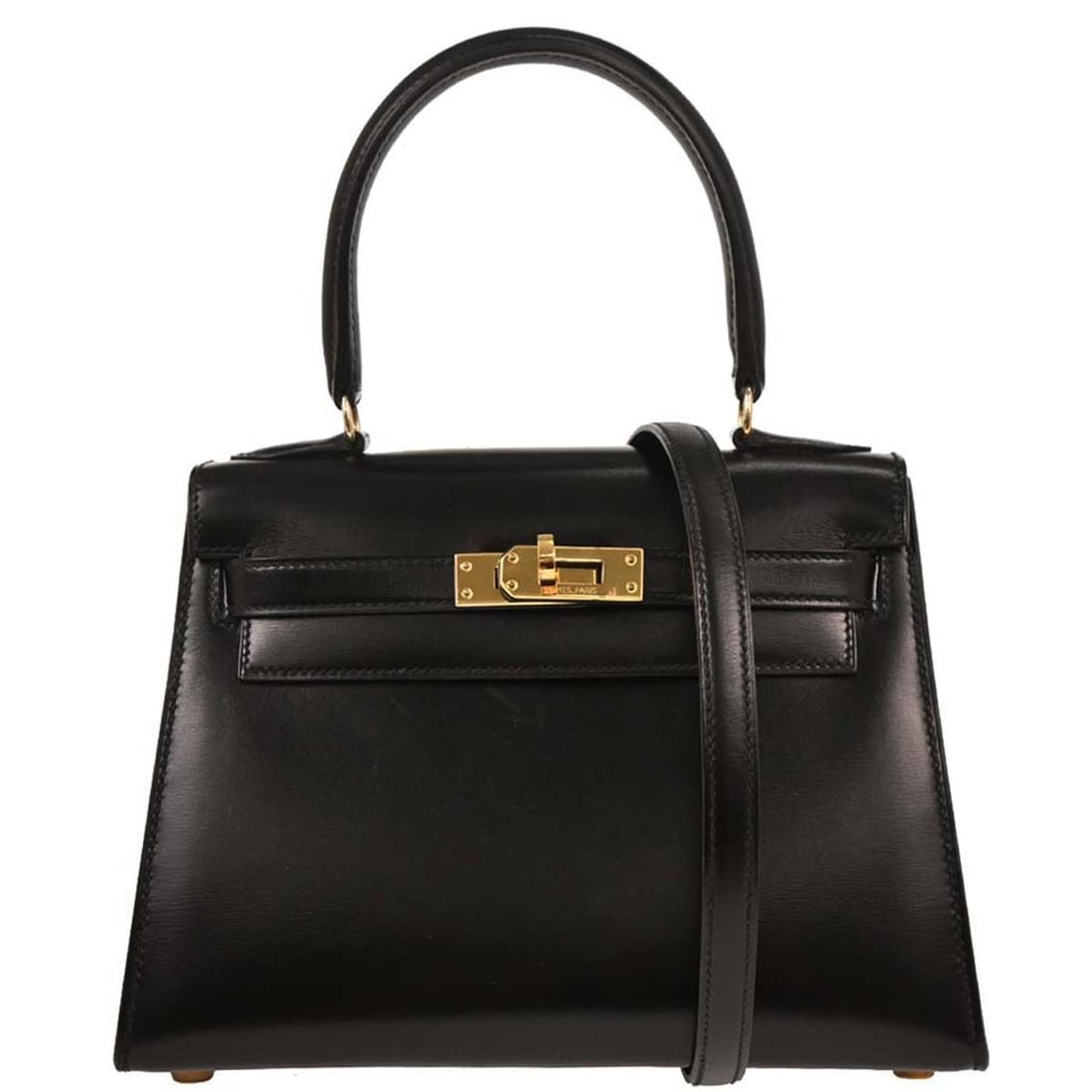 Hermes Mini Kelly 20 Black Box Calf 2-Way Handbag with Gold Hardware: Hermes Mini Kelly 20 Black Box Calf 2-Way Handbag with Gold Hardware Introducing the exquisite Hermes Black Box Calf Mini Kelly 20 2way Sellier Handbag, a luxurious accessory crafted in France. This e