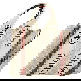 Chloe Woody Hand Bag Canvas Leather Beige Gold Auth BA8173: Chloe Woody Hand Bag Canvas Leather Beige Gold Auth BA8173 Introducing the Chloe Woody Hand Bag, a sophisticated blend of style and functionality. Crafted in Italy, this handbag features a durable can