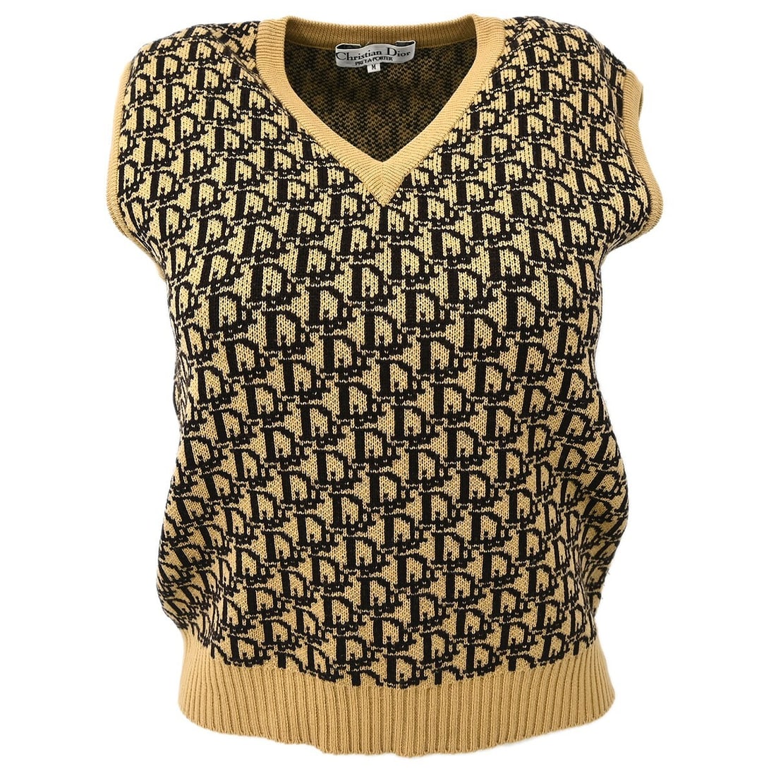 Dior Beige Sleeveless V-Neck Vest Sweater Top with Logo: Dior Beige Sleeveless V-Neck Vest Sweater Top with Logo Elevate your casual wardrobe with this chic sleeveless vest sweater top from Christian Dior. Designed in a versatile beige color, it features a