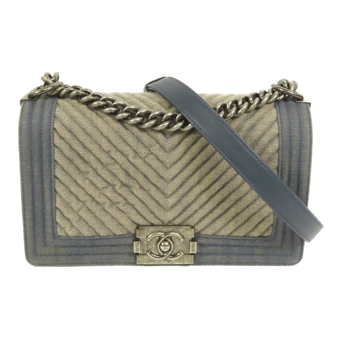 CHANEL Boy 25 Denim Blue Chain Shoulder Bag France: CHANEL Boy 25 Denim Blue Chain Shoulder Bag France Introducing the CHANEL CC Boy 25 Chain Shoulder Bag in a stunning denim blue. This stylish shoulder bag features a durable denim exterior and is desi
