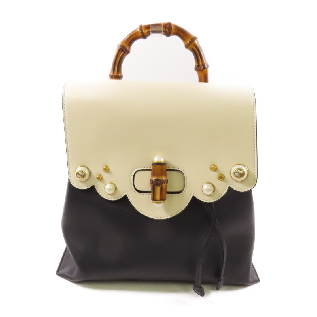 GUCCI GG Rucksack Backpack Calfskin Leather Black White GHW: GUCCI GG Rucksack Backpack Calfskin Leather Black White GHW Elevate your style with this GUCCI GG GHW Backpack, crafted from premium calfskin leather in a sophisticated black and white color palette.