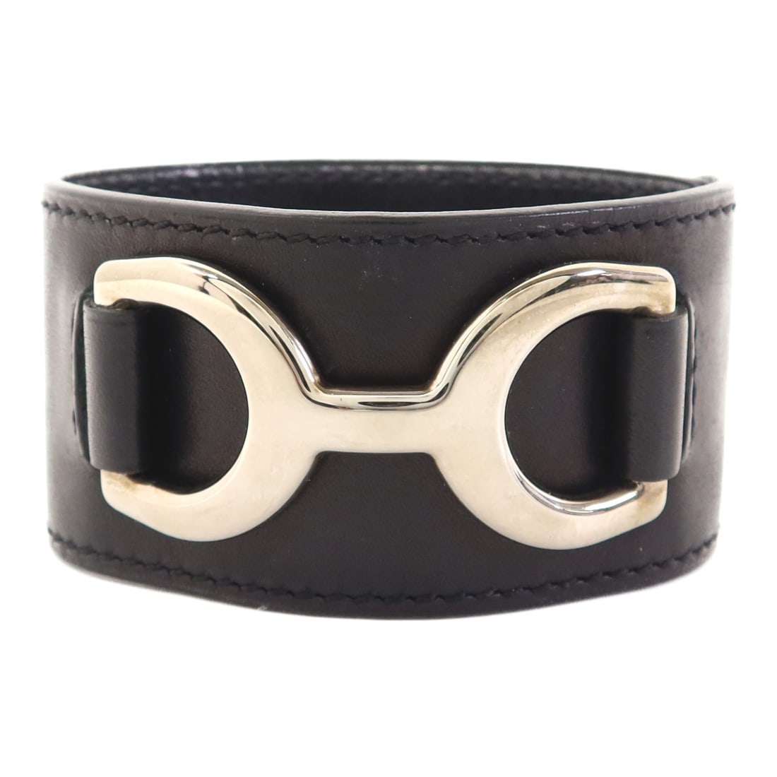 HERMES Black Leather Bangle with PHW: HERMES Black Leather Bangle with PHW This exquisite HERMES bangle is crafted from high-quality leather in a classic black finish. Designed for regular wear, it boasts a sleek and sophisticated style,
