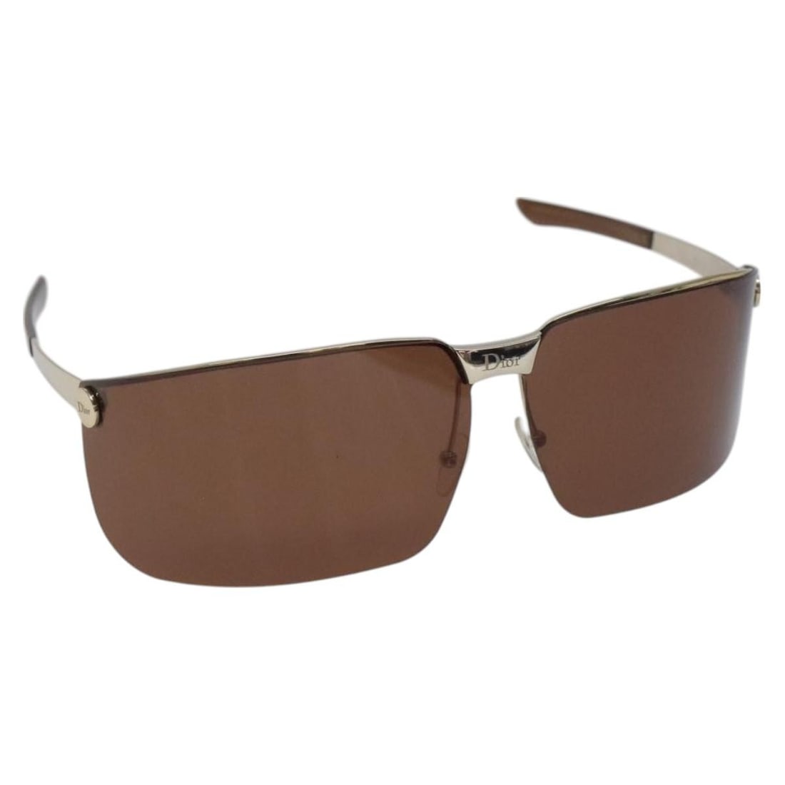 Christian Dior Brown Metal Sunglasses Auth Italy AM8575: Christian Dior Brown Metal Sunglasses Auth Italy AM8575 Elevate your accessory collection with these Christian Dior Sunglasses, expertly crafted in Italy. Featuring a sophisticated metal construction