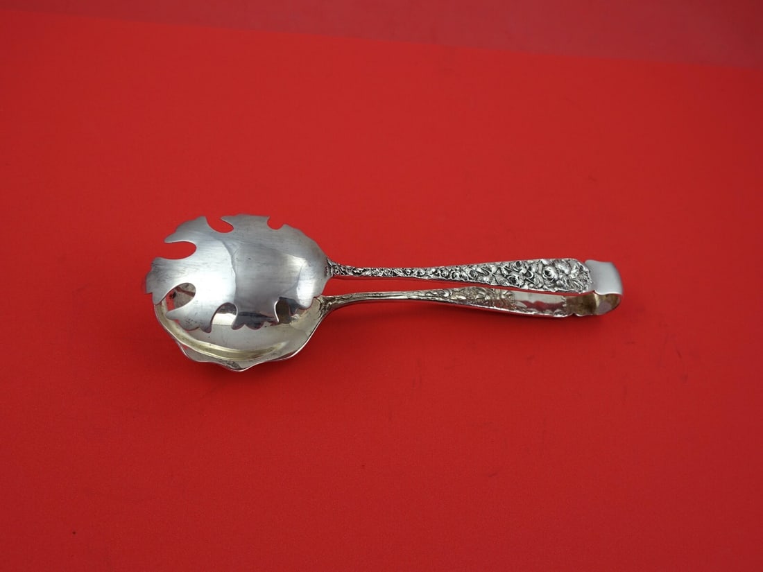 Schofield Baltimore Rose Sterling Silver Ice Tong Spoon 6 7/8 inches: Schofield Baltimore Rose Sterling Silver Ice Tong Spoon 6 7/8 inches This exquisite serving spoon features the elegant Baltimore Rose pattern by Schofield, crafted from high-quality sterling silver. M