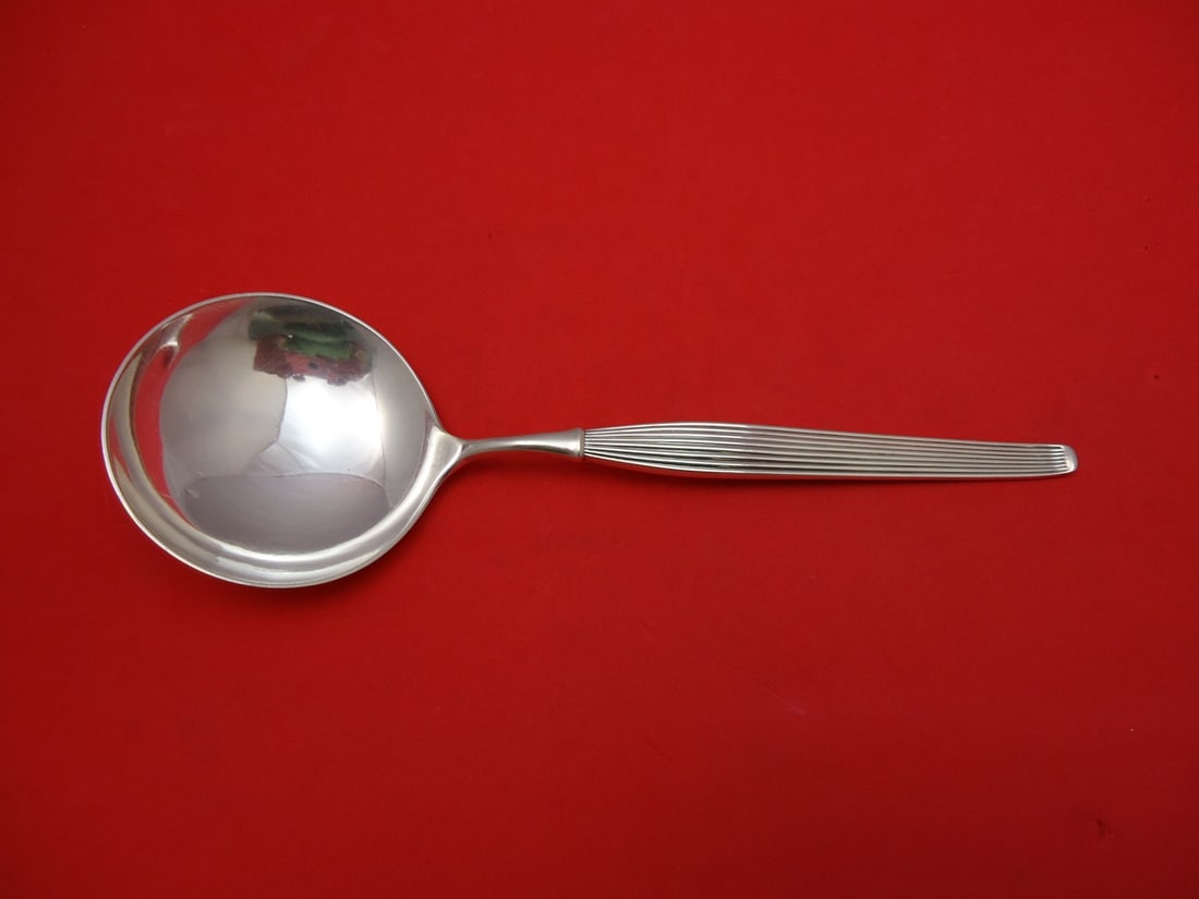 Frigast Savoy Sterling Silver Pea Spoon 8.5 Inch: Frigast Savoy Sterling Silver Pea Spoon 8.5 Inch This exquisite pea spoon is crafted from sterling silver and features the elegant Savoy pattern by Frigast. Measuring 8 1/2 inches in length, this piec