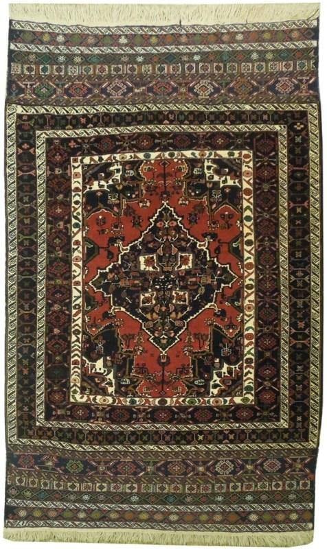 Persian Quality Wool Tribal Rug 4'4" x 6'9" Handcrafted in Iran: Persian Quality Wool Tribal Rug 4'4" x 6'9" Handcrafted in Iran Free continental US Shipping Experience the timeless elegance of this Persian Quality Wool Tribal Rug, meticulously handcrafted by skill