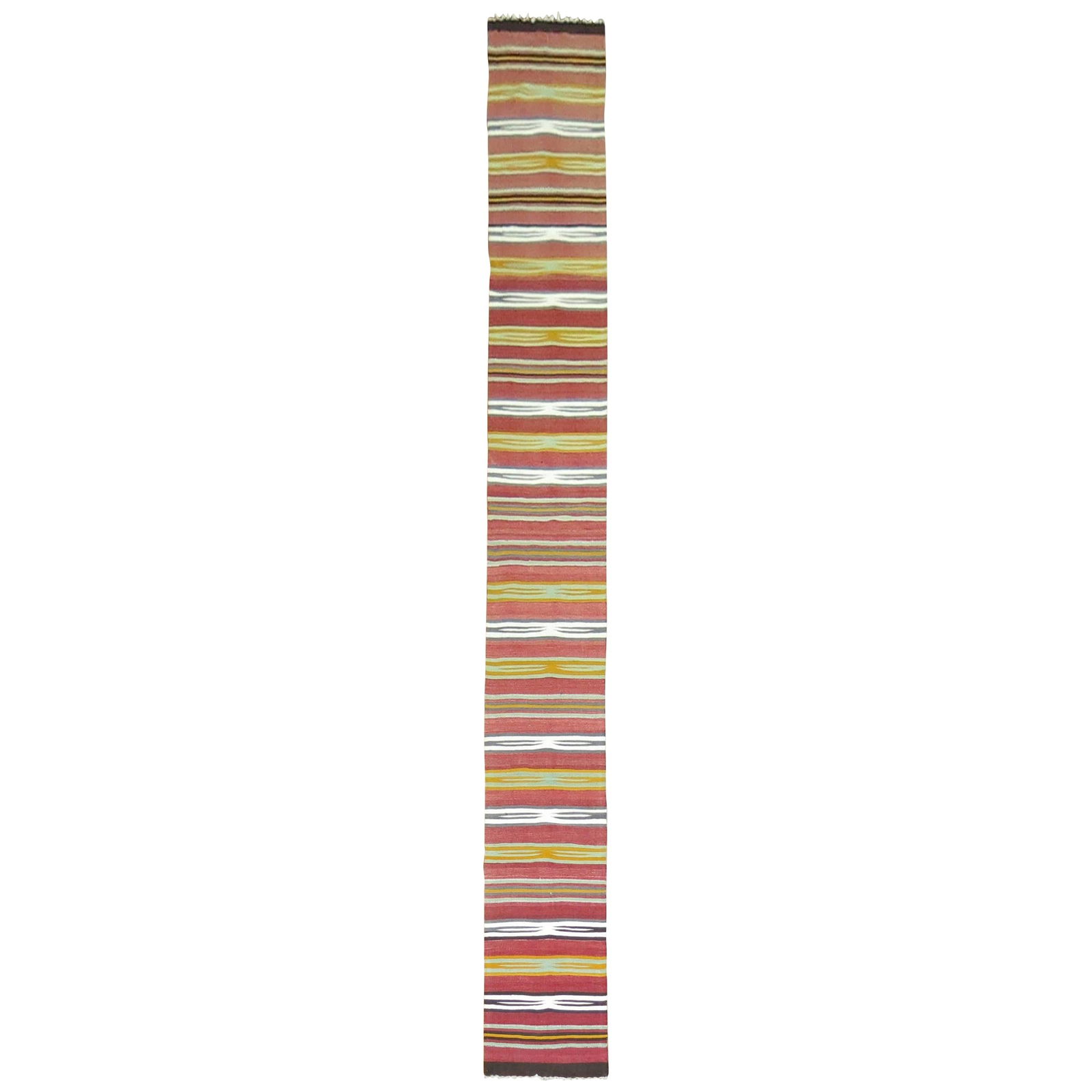 Zabihi Collection Rare Tribal Wool Kilim Runner 21 x 203 in: Zabihi Collection Rare Tribal Wool Kilim Runner 21 x 203 in Discover the beauty of this rare, narrow, and long striped Kilim runner from the Zabihi Collection. Hand-knotted in Turkey during the