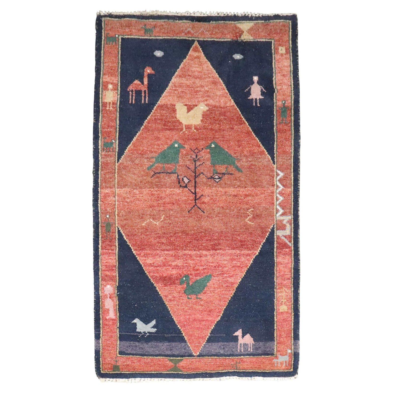 Persian Gabbeh Wool Rug Tribal Folk Art Style Hand Knotted 39 x 62 Inch: Persian Gabbeh Wool Rug Tribal Folk Art Style Hand Knotted 39 x 62 Inch This whimsical Persian Gabbeh rug features vibrant folk art motifs in a tribal style. Hand-knotted from wool, it originates from