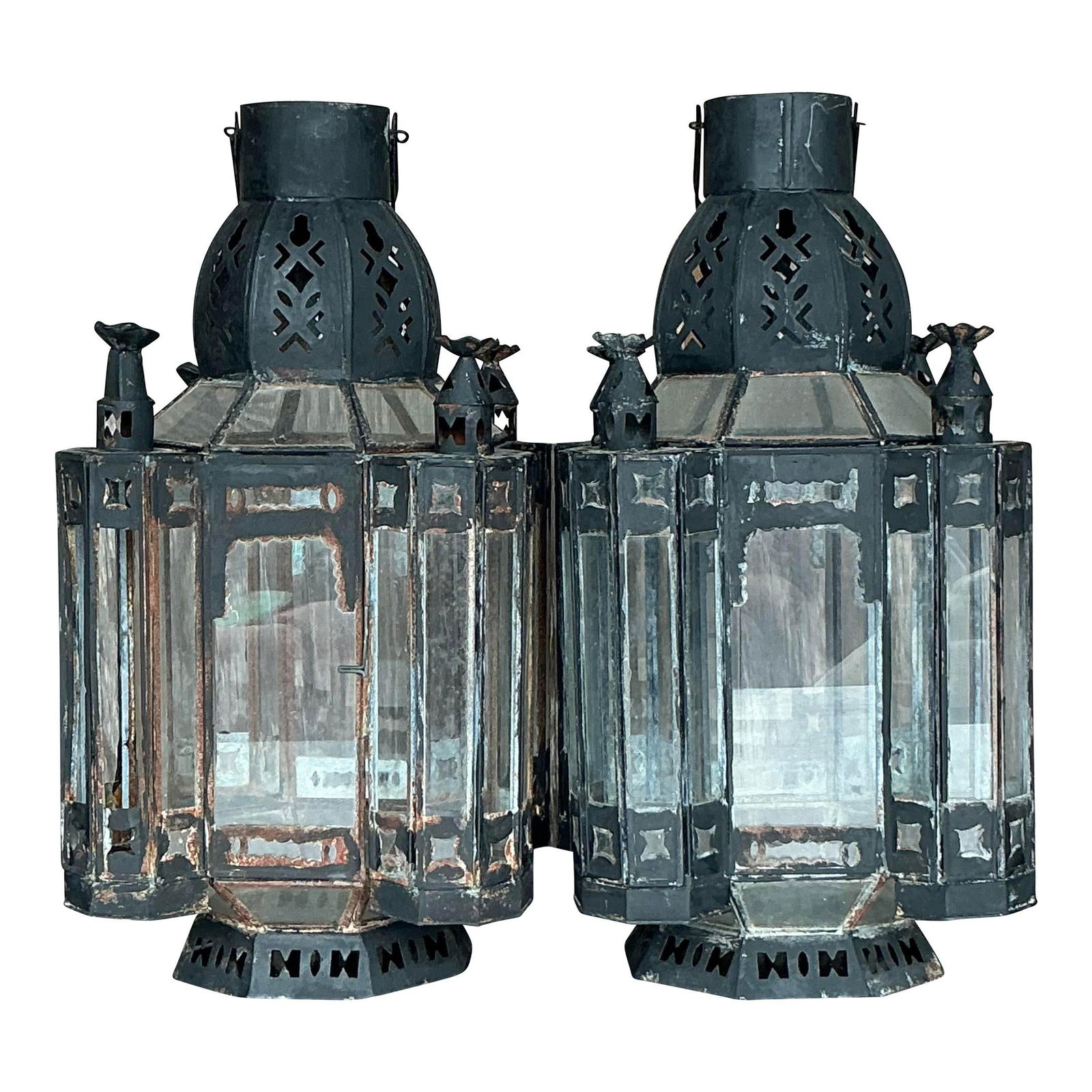 Pair of Vintage Boho Moroccan Metal Lanterns with Colorful Glass Accents: Pair of Vintage Boho Moroccan Metal Lanterns with Colorful Glass Accents Enhance your living space with this exquisite pair of Vintage Boho Moroccan Lanterns. Crafted from metal and adorned with