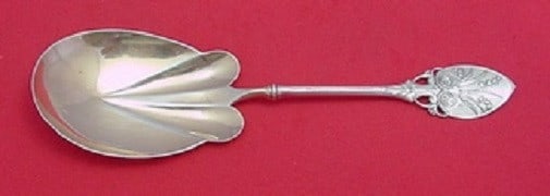 Gorham Lily aka 88 Sterling Silver Lobed Berry Spoon 7 5/8": Gorham Lily aka 88 Sterling Silver Lobed Berry Spoon 7 5/8" This elegant serving spoon features the intricate and timeless Lily aka 88 pattern by Gorham. Crafted from high-quality sterling silver, thi