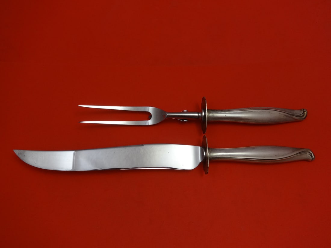 Oneida Sentimental Sterling Silver 2-Piece Roast Carving Set: Oneida Sentimental Sterling Silver 2-Piece Roast Carving Set This exquisite 2-piece roast carving set from Oneida features the elegant Sentimental pattern, crafted from high-quality sterling silver. T