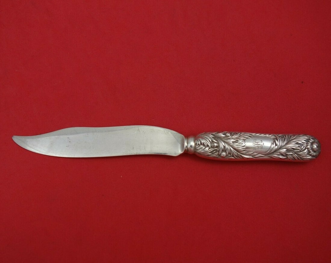 Tiffany & Co Chrysanthemum Sterling Silver Fish Knife Wide Blade 7 5/8": Tiffany & Co Chrysanthemum Sterling Silver Fish Knife Wide Blade 7 5/8" This exquisite fish knife from Tiffany & Co. features the elegant Chrysanthemum pattern and is crafted from sterling silver. Mea