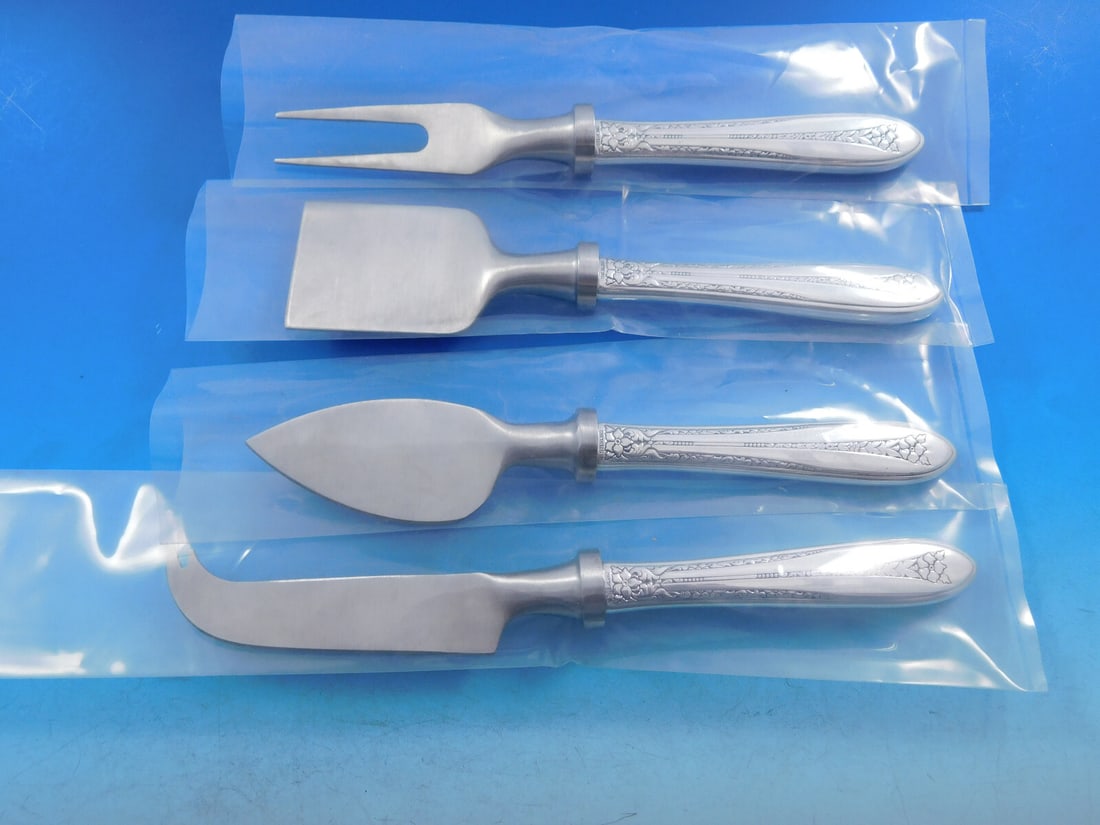 National Sterling Silver Margaret Rose 4-Piece Cheese Serving Set: National Sterling Silver Margaret Rose 4-Piece Cheese Serving Set Elevate your cheese serving experience with this exquisite 4-piece cheese serving set from the Margaret Rose pattern by National Sterl