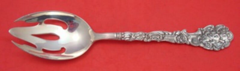 Gorham Versailles Sterling Silver Open Ended Pierced Serving Spoon 8.5": Gorham Versailles Sterling Silver Open Ended Pierced Serving Spoon 8.5" This exquisite serving spoon features the timeless Versailles pattern by Gorham, crafted from high-quality sterling silver. Meas
