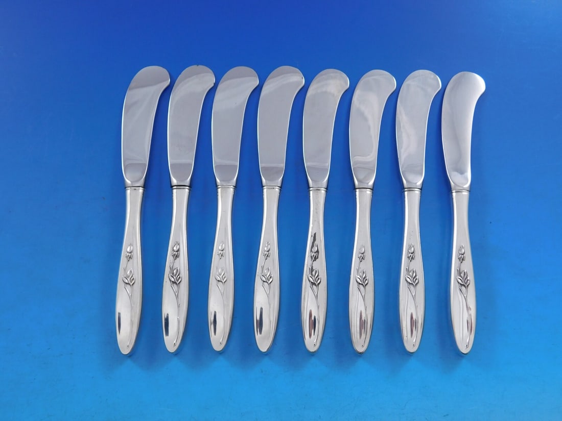Towle Rose Solitaire Sterling Silver Butter Spreader Set of 8: Towle Rose Solitaire Sterling Silver Butter Spreader Set of 8 Enhance your dining experience with this exquisite set of 8 butter spreaders from Towle, featuring the elegant Rose Solitaire pattern.