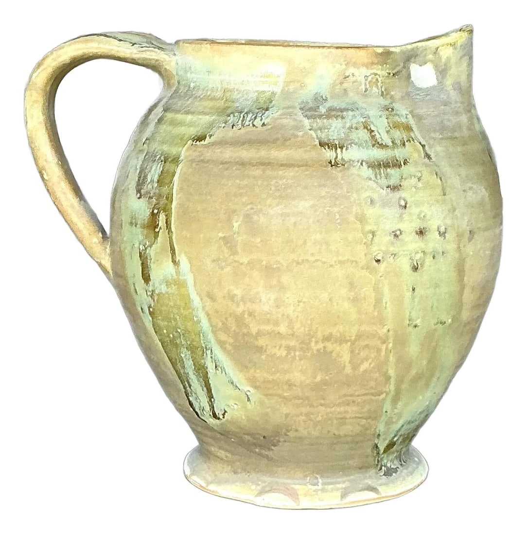 Vintage Boho Studio Pottery Pitcher Earthy Glaze 6.75in: Vintage Boho Studio Pottery Pitcher Earthy Glaze 6.75in Enhance your home decor with this vintage boho original studio pottery pitcher, a stunning example of handcrafted artistry. This ceramic piece