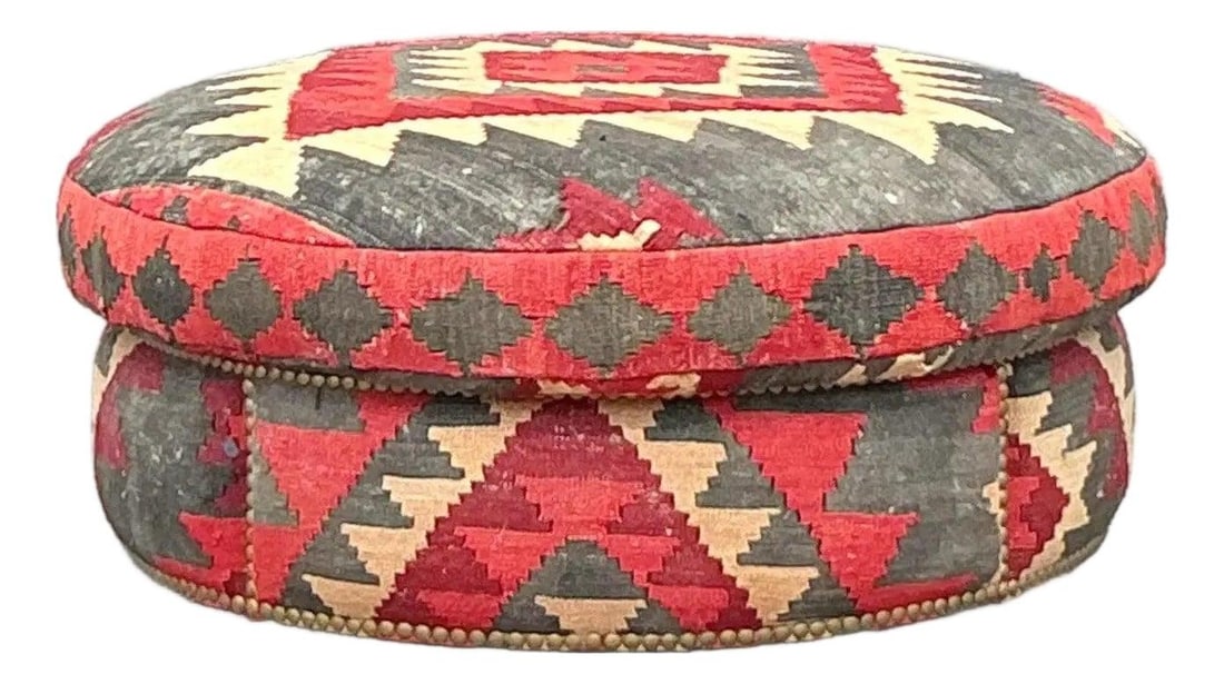 Authentic Vintage Kilim Ottoman in Earthy Tones: Authentic Vintage Kilim Ottoman in Earthy Tones Transform your living space with this Vintage Boho Kilim Ottoman, a stunning piece that embodies rich texture and global charm. Upholstered in authentic