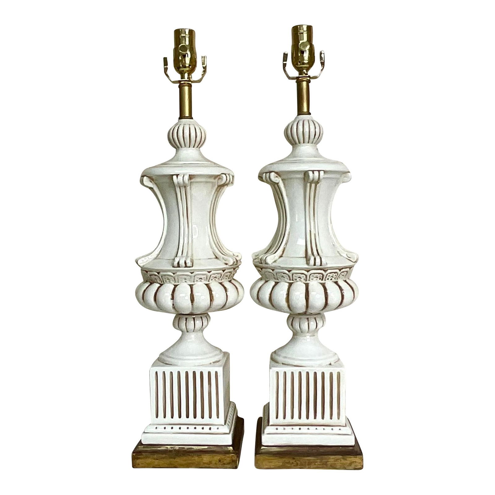 Pair of Vintage Italian Ceramic Urn Lamps Off-White Gilt Wood Base: Pair of Vintage Italian Ceramic Urn Lamps Off-White Gilt Wood Base This exquisite pair of vintage Italian glazed ceramic urn lamps features a classic urn shape, elegantly resting on gilt wood plinths.