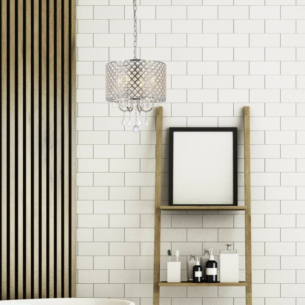 Elise Round Crystal Pendant Chandelier 4 Light Chrome Finish by Living District: Elise Round Crystal Pendant Chandelier 4 Light Chrome Finish by Living District This modern crystal pendant chandelier features a polished chrome finish and an elegant open lattice shade with royal cu
