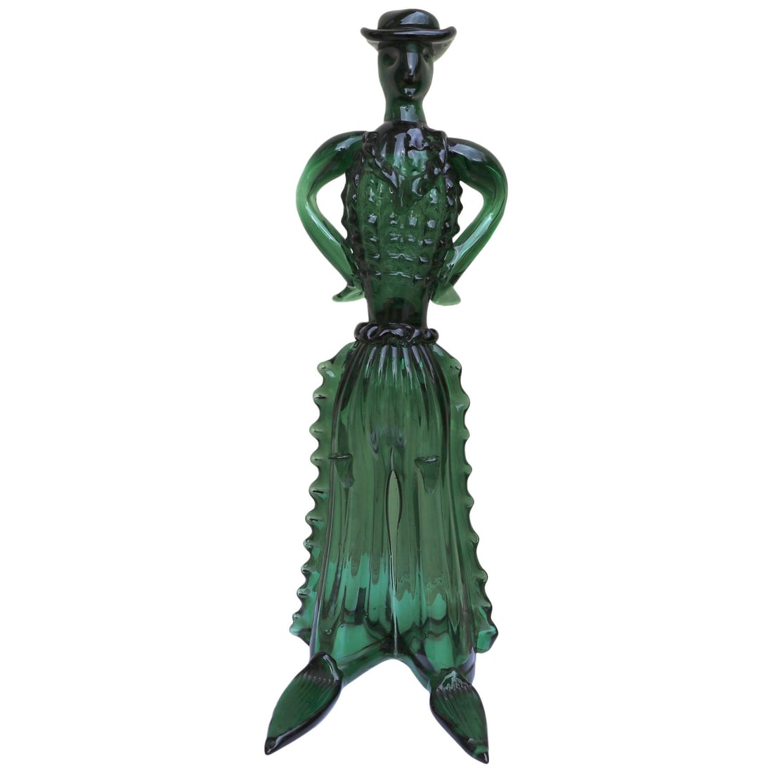 Midcentury Emerald Glass Cowboy Figure Attributed to Barovier: Midcentury Emerald Glass Cowboy Figure Attributed to Barovier This stunning figure of a Spanish cowboy is crafted from emerald green glass and is attributed to the renowned Barovier Seguso Farro. This