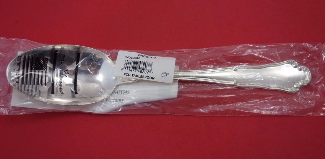 Wallace Italy Barocco Sterling Silver Pierced Serving Spoon 10" New: Wallace Italy Barocco Sterling Silver Pierced Serving Spoon 10" New Enhance your dining experience with this exquisite 10" Barocco serving spoon by Wallace-Italy. Crafted from high-quality sterling si