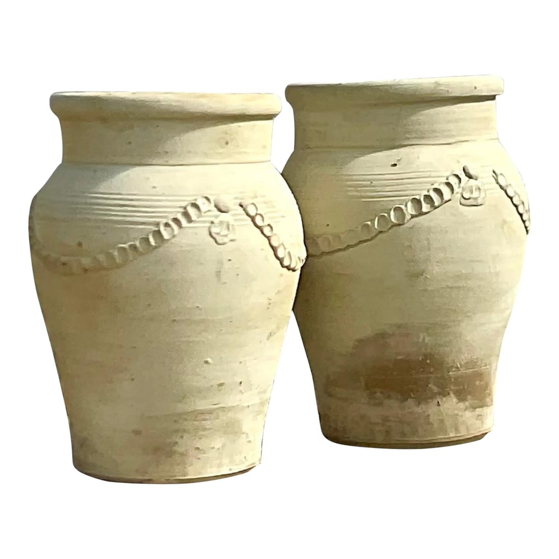 Pair of Vintage Cream Terracotta Planters with Patina: Pair of Vintage Cream Terracotta Planters with Patina Enhance your outdoor or indoor spaces with this exquisite pair of vintage terracotta planters. Each planter features a charming cream color and