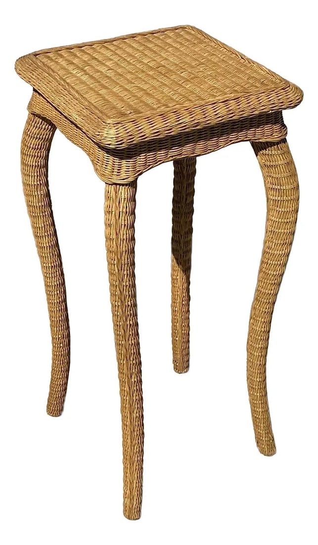 Vintage Woven Rattan Pedestal Stand with Cabriole Legs: Vintage Woven Rattan Pedestal Stand with Cabriole Legs Enhance your decor with this vintage woven rattan pedestal, exuding breezy coastal charm. This elegantly crafted piece features gently curving ca
