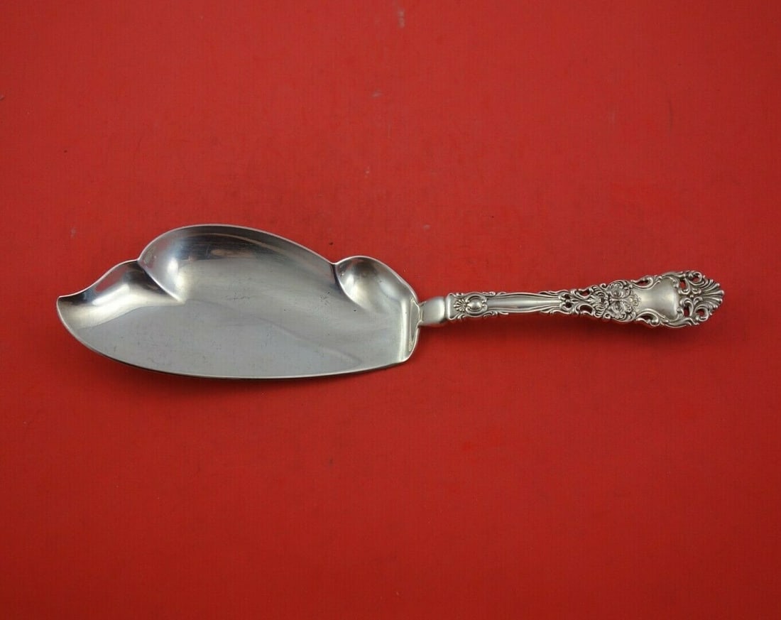 Dominick & Haff Renaissance Sterling Silver Fish Server 11 1/8": Dominick & Haff Renaissance Sterling Silver Fish Server 11 1/8" This stunning Renaissance fish server, crafted by Dominick & Haff, showcases exquisite artistry in sterling silver. With a substantial l