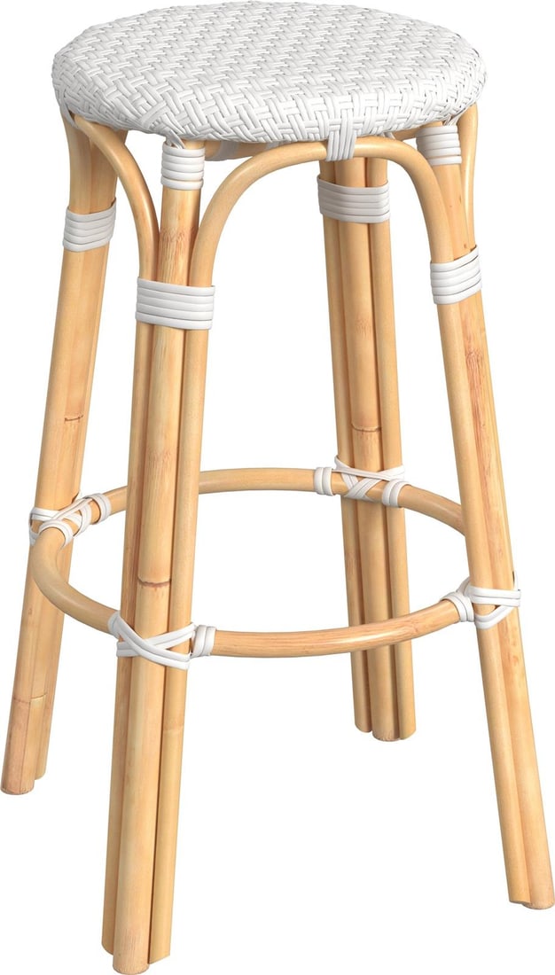 Butler Coastal Rattan Bar Stool Natural White 30H Round: Butler Coastal Rattan Bar Stool Natural White 30H Round Elevate your coastal decor with this stylish Butler Coastal Rattan Stool. Featuring a natural rattan frame finished in glossy white, this round
