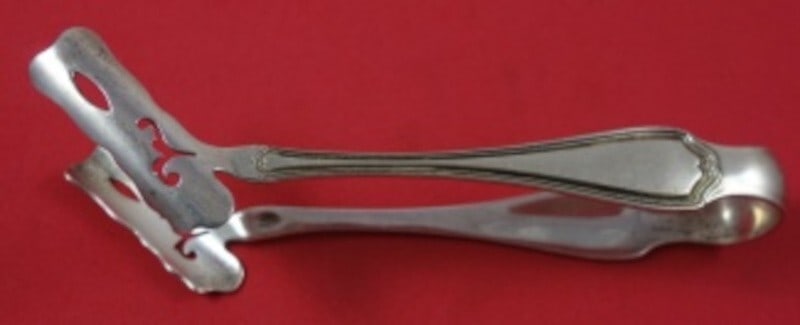 Reed and Barton Hepplewhite Sterling Silver Asparagus Tong Pierced 5 3/4 Inch: Reed and Barton Hepplewhite Sterling Silver Asparagus Tong Pierced 5 3/4 Inch Elevate your dining experience with this exquisite Hepplewhite individual asparagus tong by Reed & Barton. Crafted from hi
