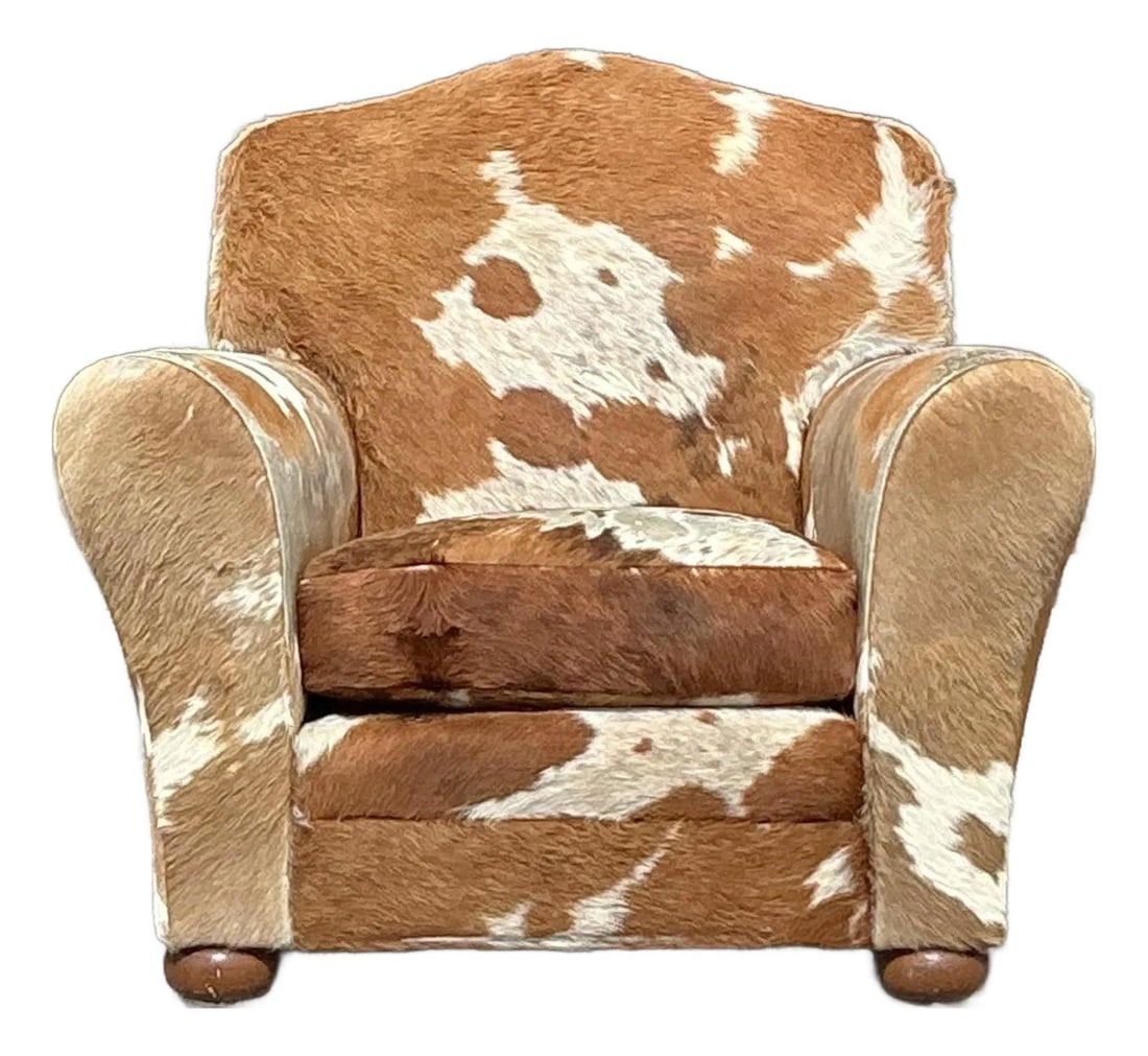 Unique Vintage Boho Cowhide Roll Arm Lounge Chair: Unique Vintage Boho Cowhide Roll Arm Lounge Chair Introducing a stunning vintage lounge chair that makes a bold statement in any space. Upholstered in genuine brown and white cowhide, each chair is a