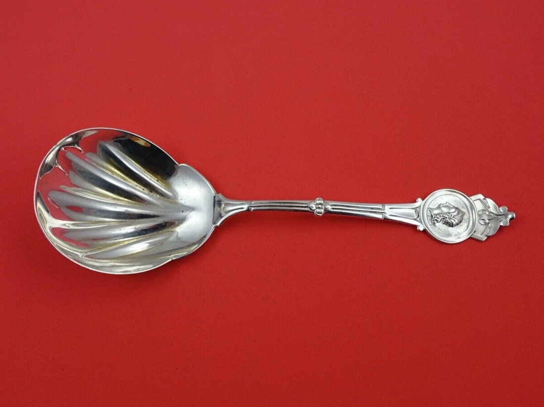 Gorham Medallion Sterling Silver Berry Spoon 8.5 Fluted Bowl: Gorham Medallion Sterling Silver Berry Spoon 8.5 Fluted Bowl This exquisite 8 1/2" berry spoon is crafted in sterling silver by Gorham, showcasing the elegant Medallion pattern. The spoon features a b