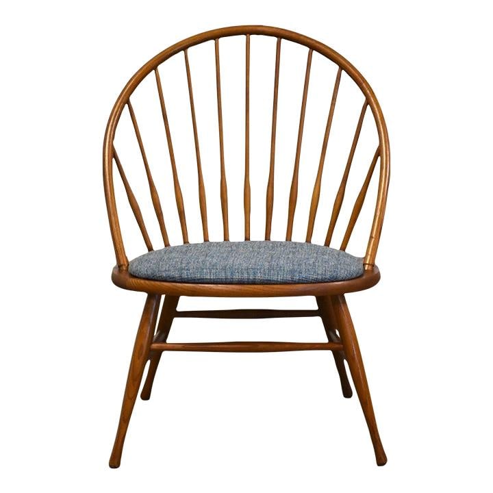 Heywood Wakefield Mid Century Modern Teak Lounge Chair with Blue Seat: Heywood Wakefield Mid Century Modern Teak Lounge Chair with Blue Seat This Mid Century Modern Lounge Chair showcases a classic Windsor back design, crafted in a rich teak color. It features a newly re