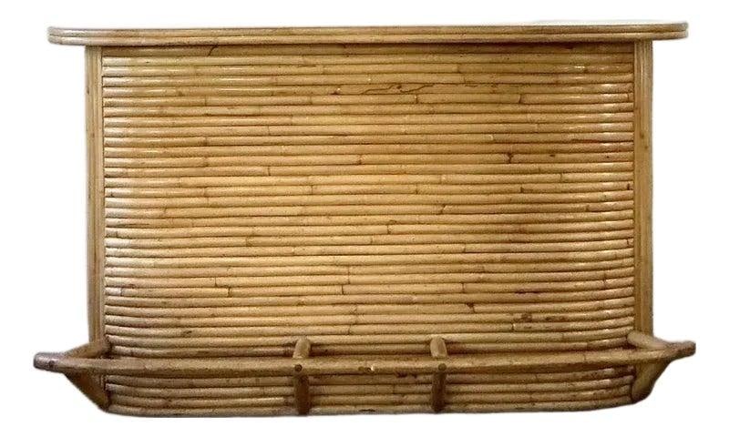 Vintage 1970s Boho Chic Rattan Dry Bar with Storage: Vintage 1970s Boho Chic Rattan Dry Bar with Storage Experience the relaxed elegance of the 1970s with this Vintage Boho Bent Rattan Dry Bar. This exquisite piece showcases a sweeping, curvilinear desi