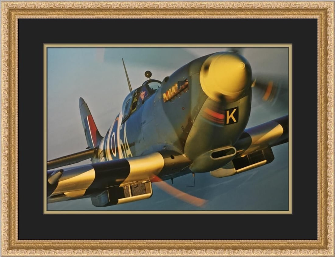 Custom Framed Supermarine Spitfire LF Mk IXc Print by Philip Makanna: Custom Framed Supermarine Spitfire LF Mk IXc Print by Philip Makanna This stunning custom framed print showcases the Supermarine Spitfire LF Mk IXc, a celebrated aircraft in aviation history. Created