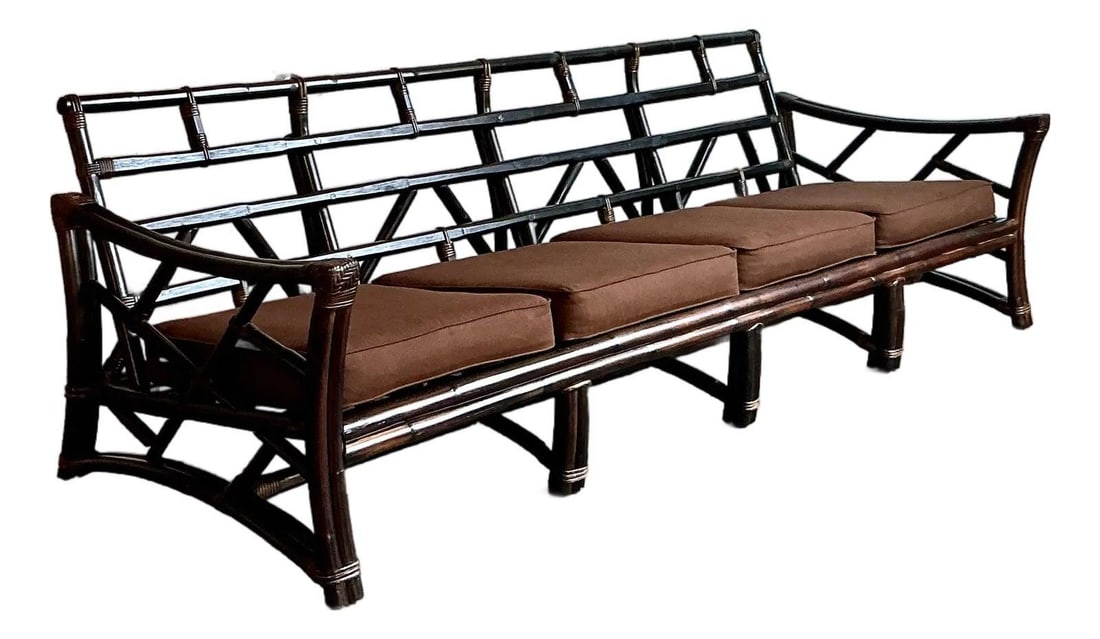 Vintage Rattan Slope Arm Sofa Inspired by Ficks Reed: Vintage Rattan Slope Arm Sofa Inspired by Ficks Reed Experience the timeless charm of tropical modern design with this vintage slope-arm rattan sofa, crafted in the iconic style of Ficks Reed. Featuri