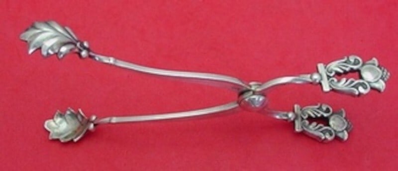 Georg Jensen Acorn Sterling Silver Ice Tongs 6 1/8 Inch Serving Piece: Georg Jensen Acorn Sterling Silver Ice Tongs 6 1/8 Inch Serving Piece This exquisite ice tong is part of the Acorn pattern by Georg Jensen, expertly crafted from high-quality sterling silver. Measurin