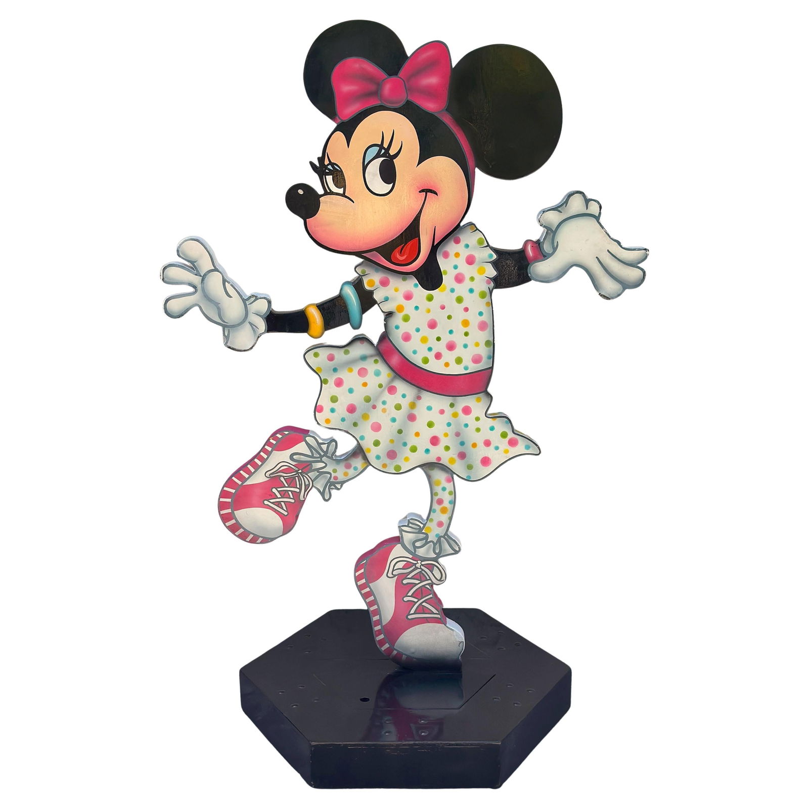 Walt Disney Life-Size Dancing Minnie Mouse Sculpture on Wheels: Walt Disney Life-Size Dancing Minnie Mouse Sculpture on Wheels Celebrate the joy of Disney with this life-size sculpture of Dancing Minnie Mouse, crafted from hand-painted carved wood. Standing at an