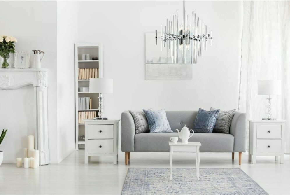 Modern 8-Light Sienna Chrome Chandelier with Glass Rods: Modern 8-Light Sienna Chrome Chandelier with Glass Rods Illuminate your living space with this stunning Sputnik Chandelier featuring a modern design and a chrome finish. This eye-catching fixture boas