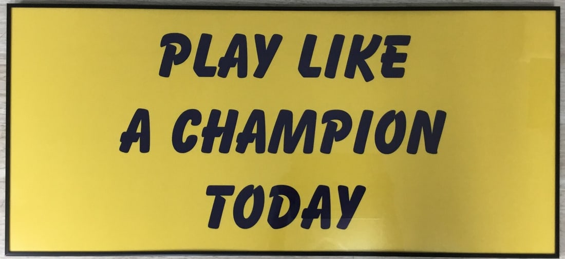 Rudy Ruettiger Play Like A Champion Framed Inspirational Quote 16 x 36: Rudy Ruettiger Play Like A Champion Framed Inspirational Quote 16 x 36 This stunning framed print features the inspirational quote "Play Like A Champion Today" by Rudy Ruettiger, making it a perfect a