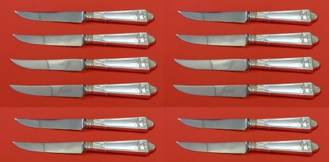 Gorham Lansdowne Sterling Silver Steak Knife Set of 12 8 1/2 inches: Gorham Lansdowne Sterling Silver Steak Knife Set of 12 8 1/2 inches This exquisite set features 12 custom-made steak knives crafted in the classic Lansdowne pattern by Gorham. Each knife boasts a holl