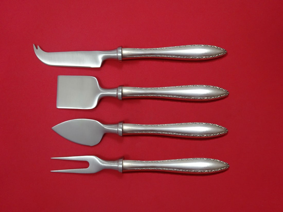 Wallace Michele Sterling Silver Cheese Serving Set 4 Pieces: Wallace Michele Sterling Silver Cheese Serving Set 4 Pieces This exquisite 4-piece cheese serving set from the Michele pattern by Wallace is crafted from high-quality sterling silver with a hollow han