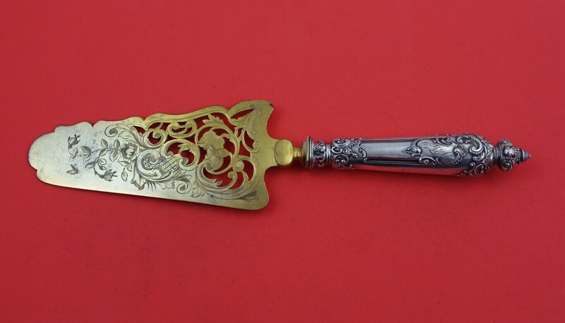 French Sterling Silver Cake Server 10 1/4" Gold Washed Engraved: French Sterling Silver Cake Server 10 1/4" Gold Washed Engraved Presenting a stunning French Sterling silver cake server, expertly crafted by various makers. This exquisite serving piece features a ho
