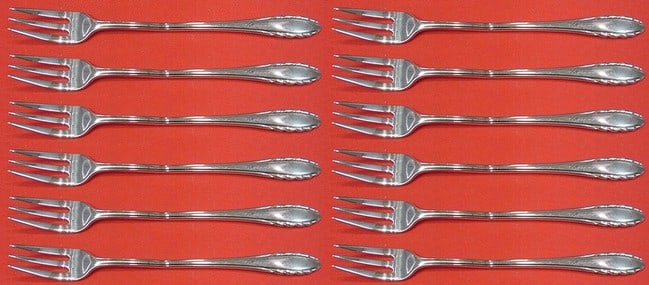 Gorham Lyric Sterling Silver Cocktail Forks Set of 12: Gorham Lyric Sterling Silver Cocktail Forks Set of 12 Enhance your dining experience with this exquisite 12-piece set of cocktail forks from the Lyric pattern by Gorham. Crafted from high-quality ster