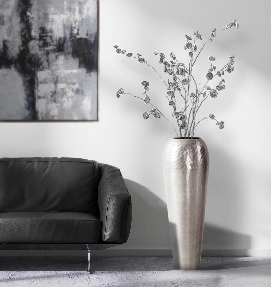 Howard Elliott Espen Round Hammered Aluminum Decorative Bottle: Howard Elliott Espen Round Hammered Aluminum Decorative Bottle Enhance your decor with the Espen Silver Aluminum Decorative Bottle, a stunning piece from the Howard Elliott collection. This decorative